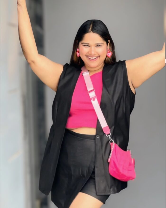 Trendy black co-ord outfit with sleeveless blazer and skort