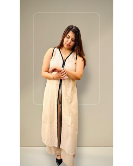 Ivory coord set with sleeveless front-open overlay and wide-leg trousers